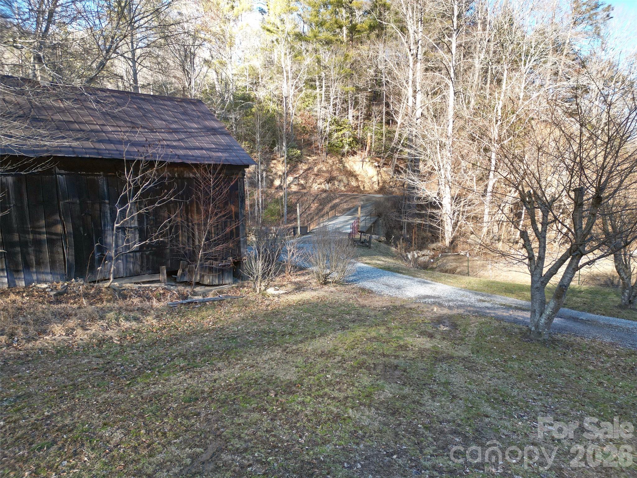 7385 Big Pine Road Marshall, NC 28753 - Photo 31 of 38 a front view of a house with a yard