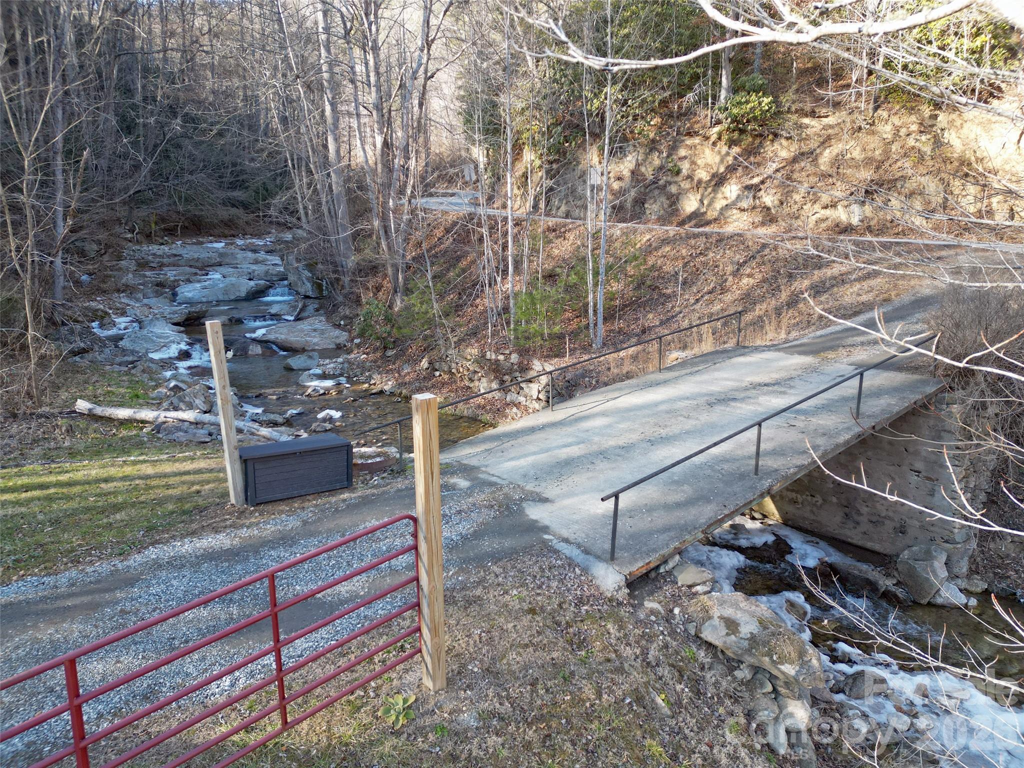 7385 Big Pine Road Marshall, NC 28753 - Photo 9 of 38 a view of a yard with an outdoor space