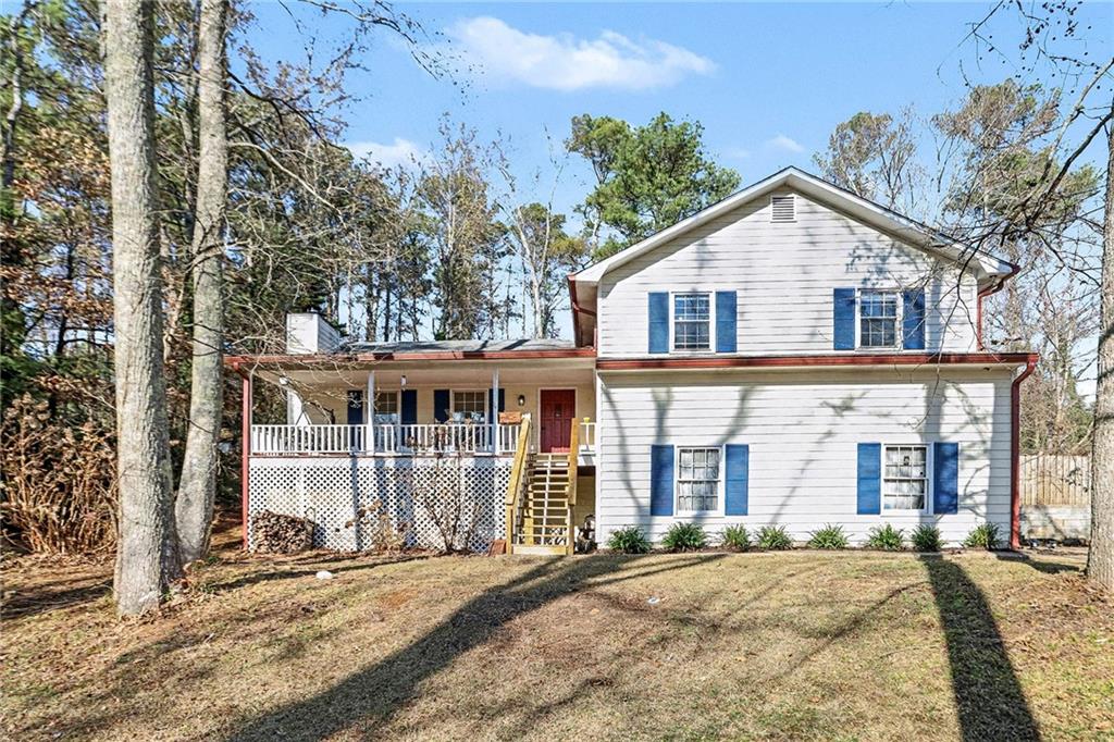 211 Powder Mill Drive Dallas, GA 30157 - Photo 1 of 1 front view of a house with a yard