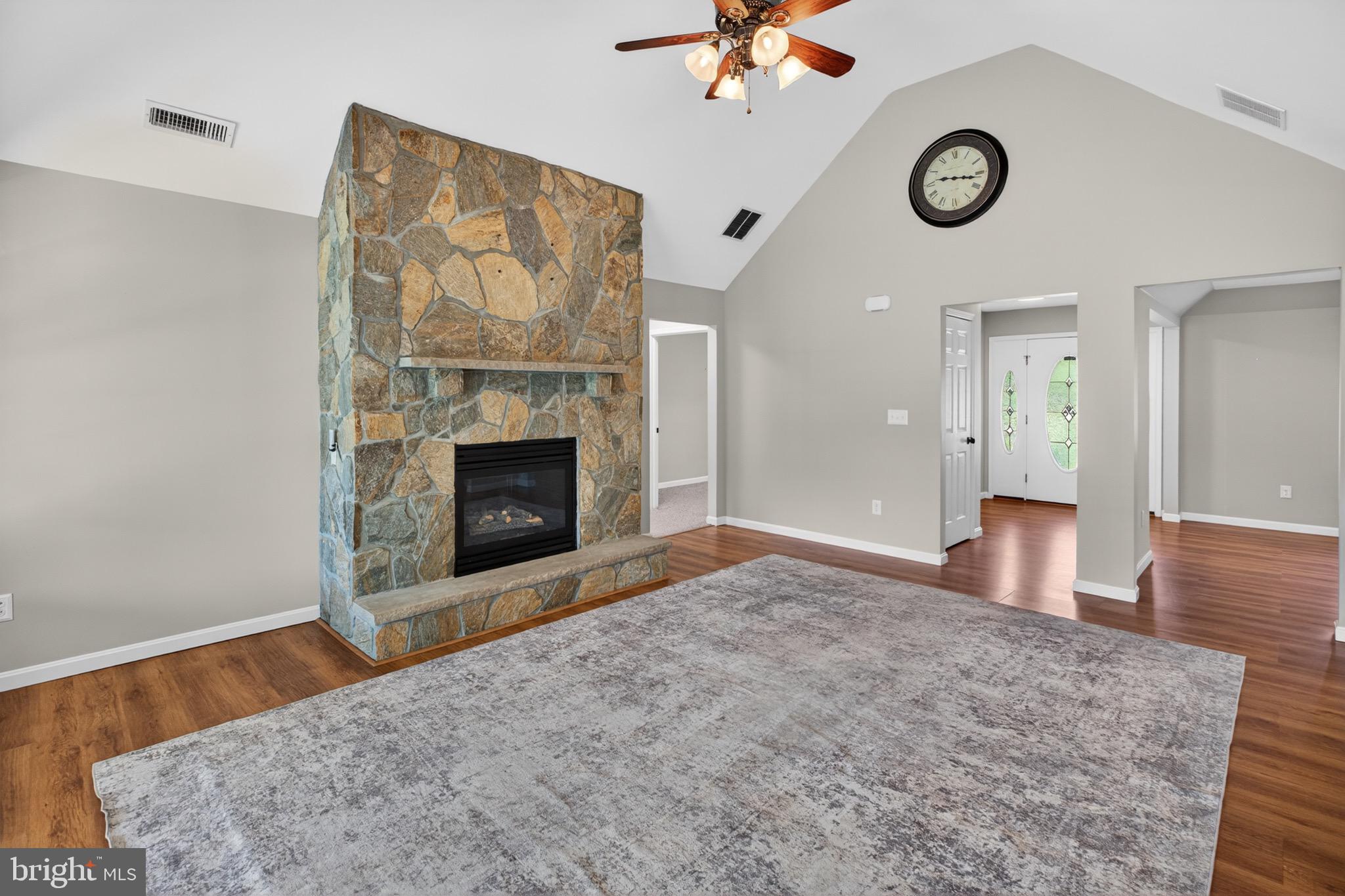 18315 Atlanta Road Bridgeville, DE 19933 - Photo 5 of 28 a view of an empty room with a fireplace