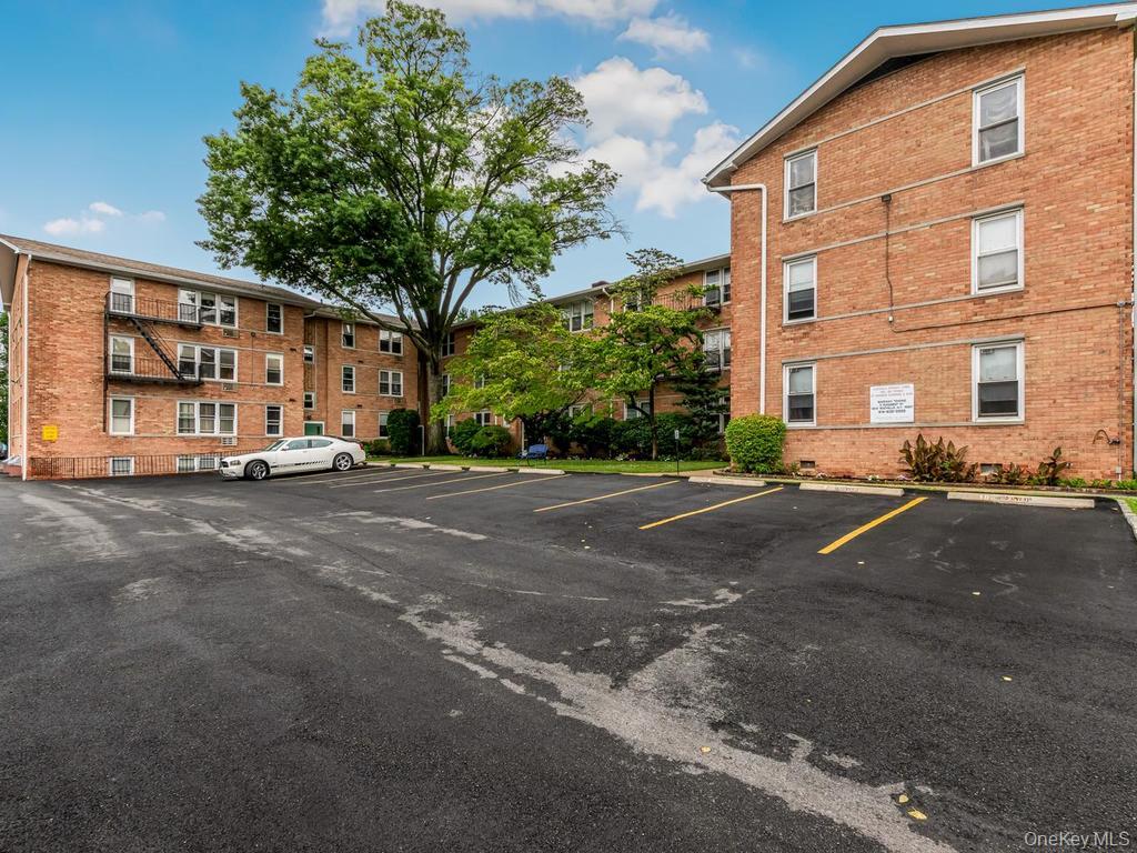 25 Trinity Place, Unit 3J New Rochelle, NY 10805 - Photo 14 of 15 Front Parking Lot