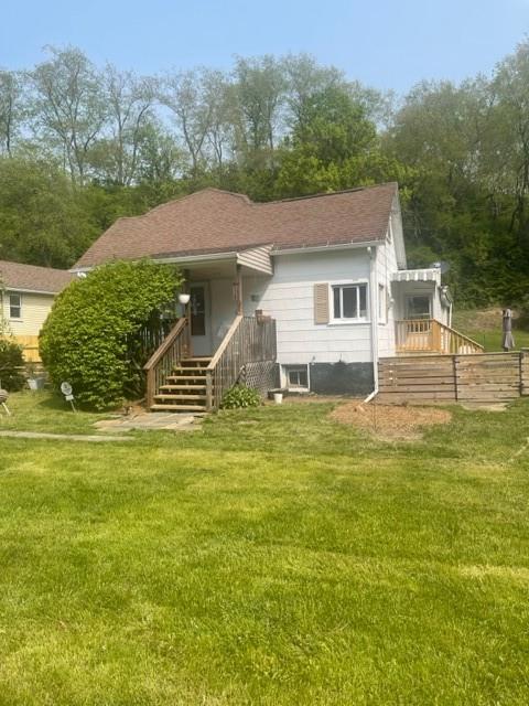 1927 Millerstown Road Tarentum, PA 15084 - Photo 1 of 23 a front view of a house with a garden