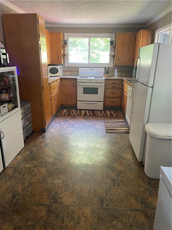 1927 Millerstown Road Tarentum, PA 15084 - Photo 4 of 23 a view of kitchen with sink refrigerator and window