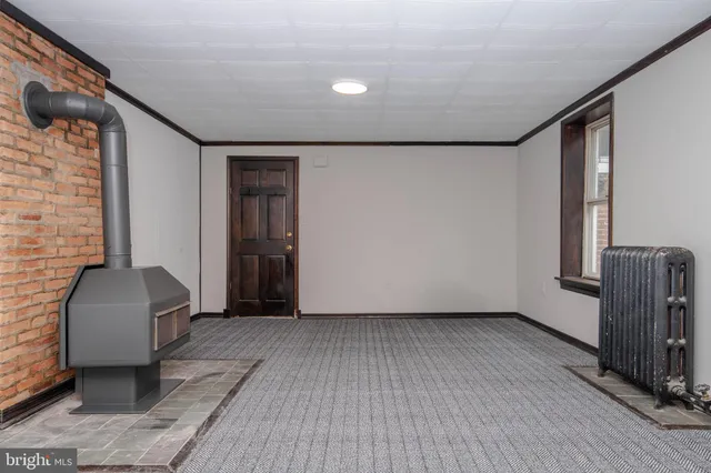a view of livingroom with furniture and wooden floor