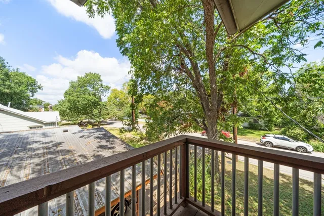 a view of a balcony with mountain view