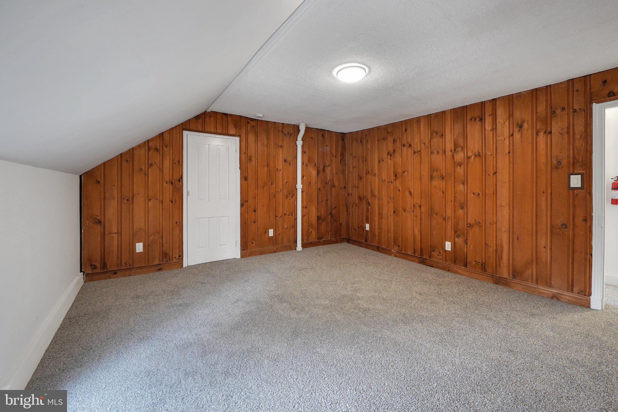 1718 Kohl Street Philadelphia, PA 19115 - Photo 25 of 34 Cozy attic space with wooden accents.