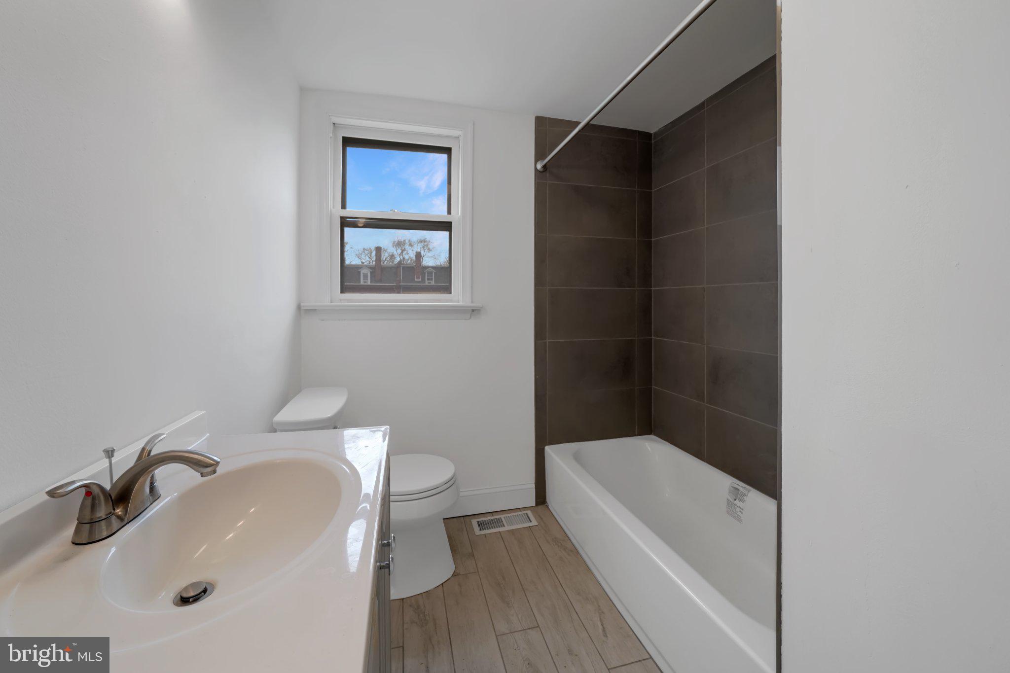 1718 Kohl Street Philadelphia, PA 19115 - Photo 31 of 34 Modern bathroom with natural light.