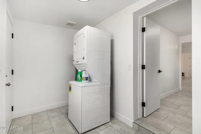 a room with a cabinets and a sink