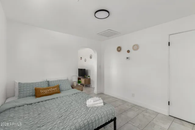 a view of dining room with two sink and a chandelier