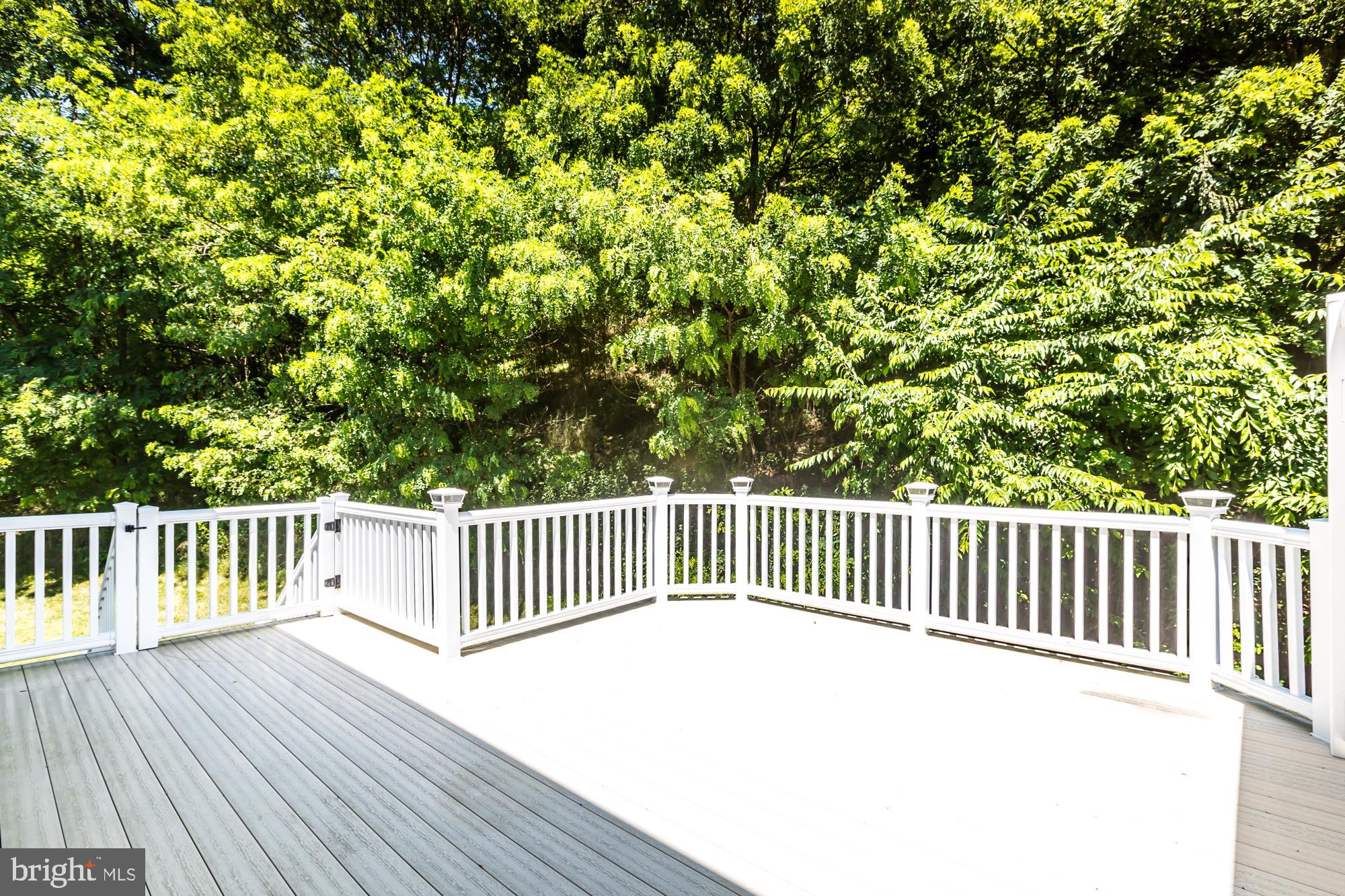 684 Churchill Road Chester Springs, PA 19425 - Photo 48 of 54 a balcony with wooden floor and fence