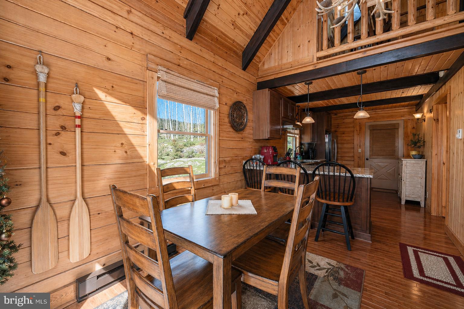 4502 Hileman Road Bruceton Mills, WV 26525 - Photo 20 of 62 a dining room with furniture and wooden floor