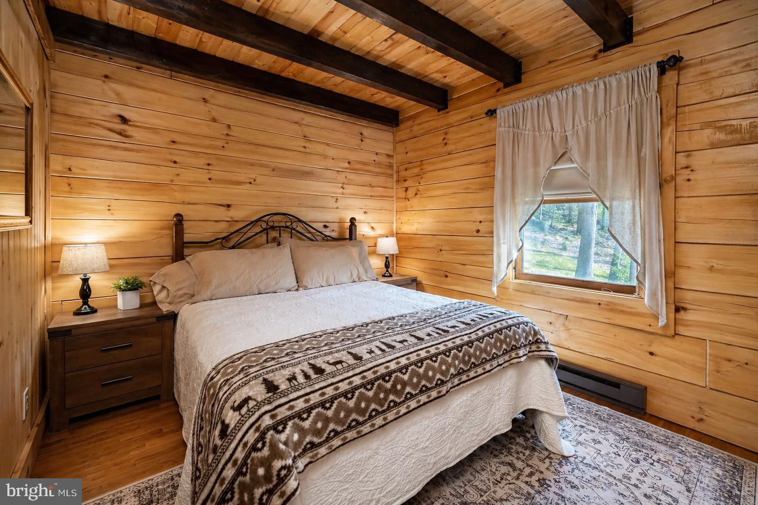 4502 Hileman Road Bruceton Mills, WV 26525 - Photo 21 of 62 a bedroom with a bed and a window