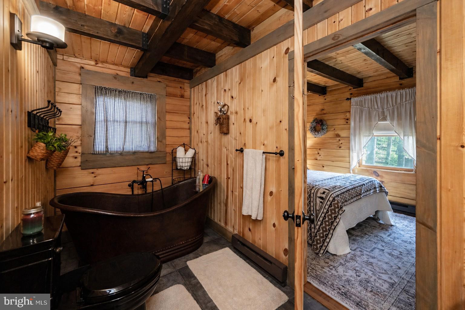 4502 Hileman Road Bruceton Mills, WV 26525 - Photo 27 of 62 a room with a bed and a window
