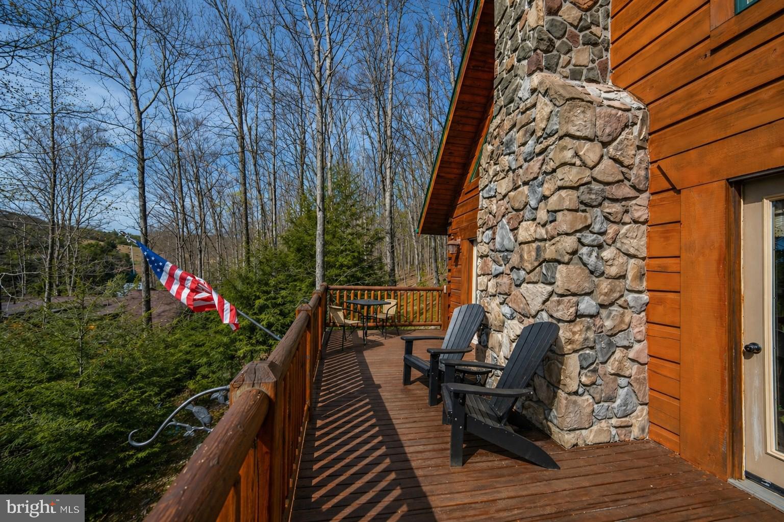 4502 Hileman Road Bruceton Mills, WV 26525 - Photo 50 of 62 a balcony with wooden floor and an outdoor space