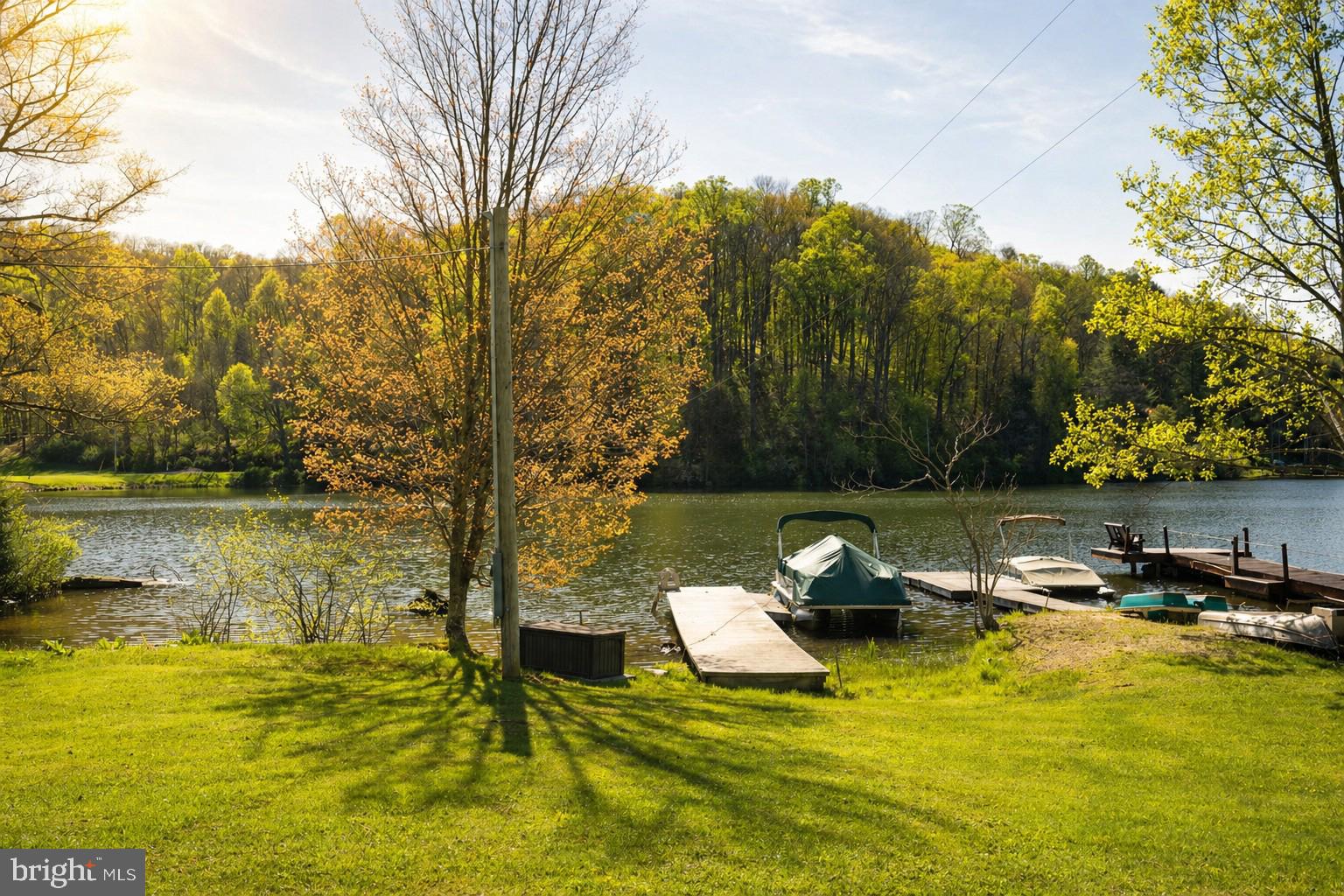4502 Hileman Road Bruceton Mills, WV 26525 - Photo 61 of 62 a view of a lake with a trees