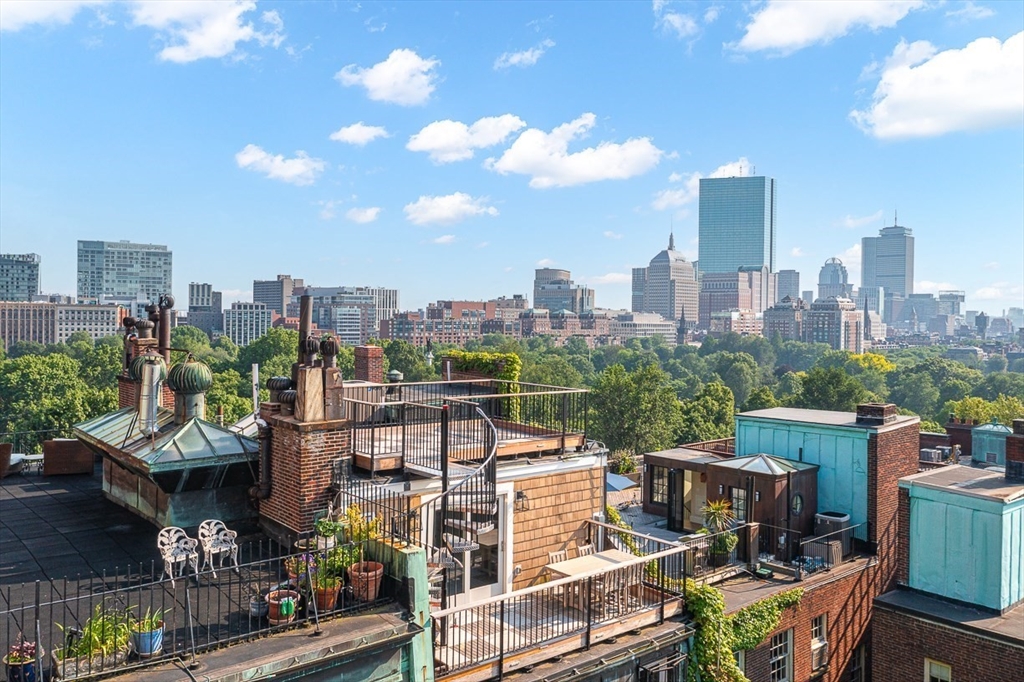 a view of a city with tall buildings