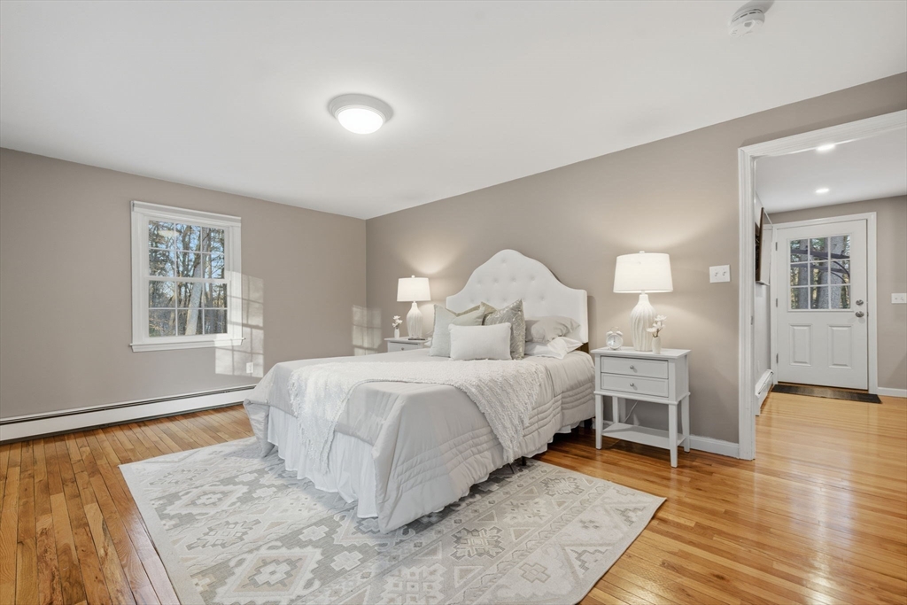 40 Curtis Road Boxford, MA 01921 - Photo 15 of 40 a bed room with a bed and a table