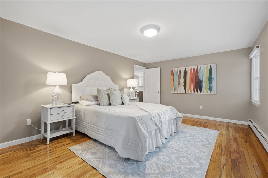 40 Curtis Road Boxford, MA 01921 - Photo 16 of 40 a bed room with a bed and a window