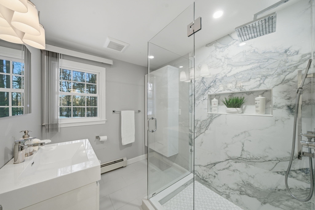 40 Curtis Road Boxford, MA 01921 - Photo 17 of 40 a bathroom with a sink shower and a mirror