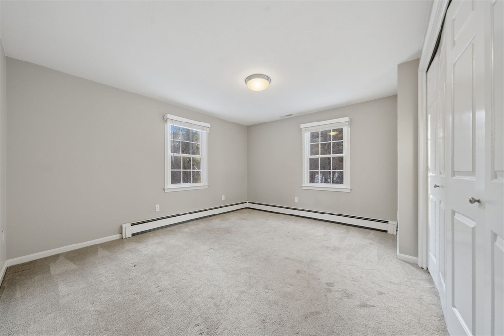 40 Curtis Road Boxford, MA 01921 - Photo 22 of 34 a view of an empty room with a window