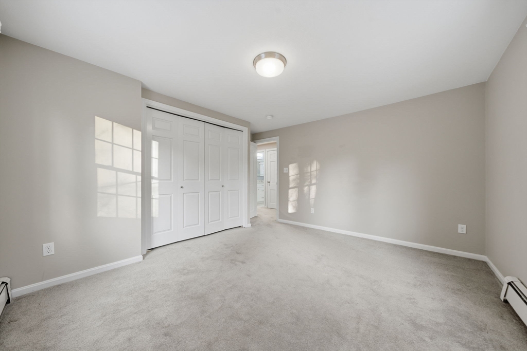 40 Curtis Road Boxford, MA 01921 - Photo 25 of 34 a view of an empty room with a window