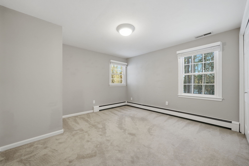40 Curtis Road Boxford, MA 01921 - Photo 26 of 34 an empty room with windows