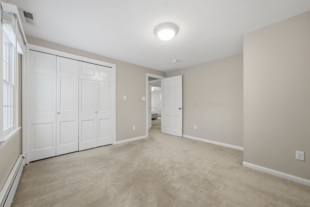 40 Curtis Road Boxford, MA 01921 - Photo 27 of 34 a view of an empty room and closet area