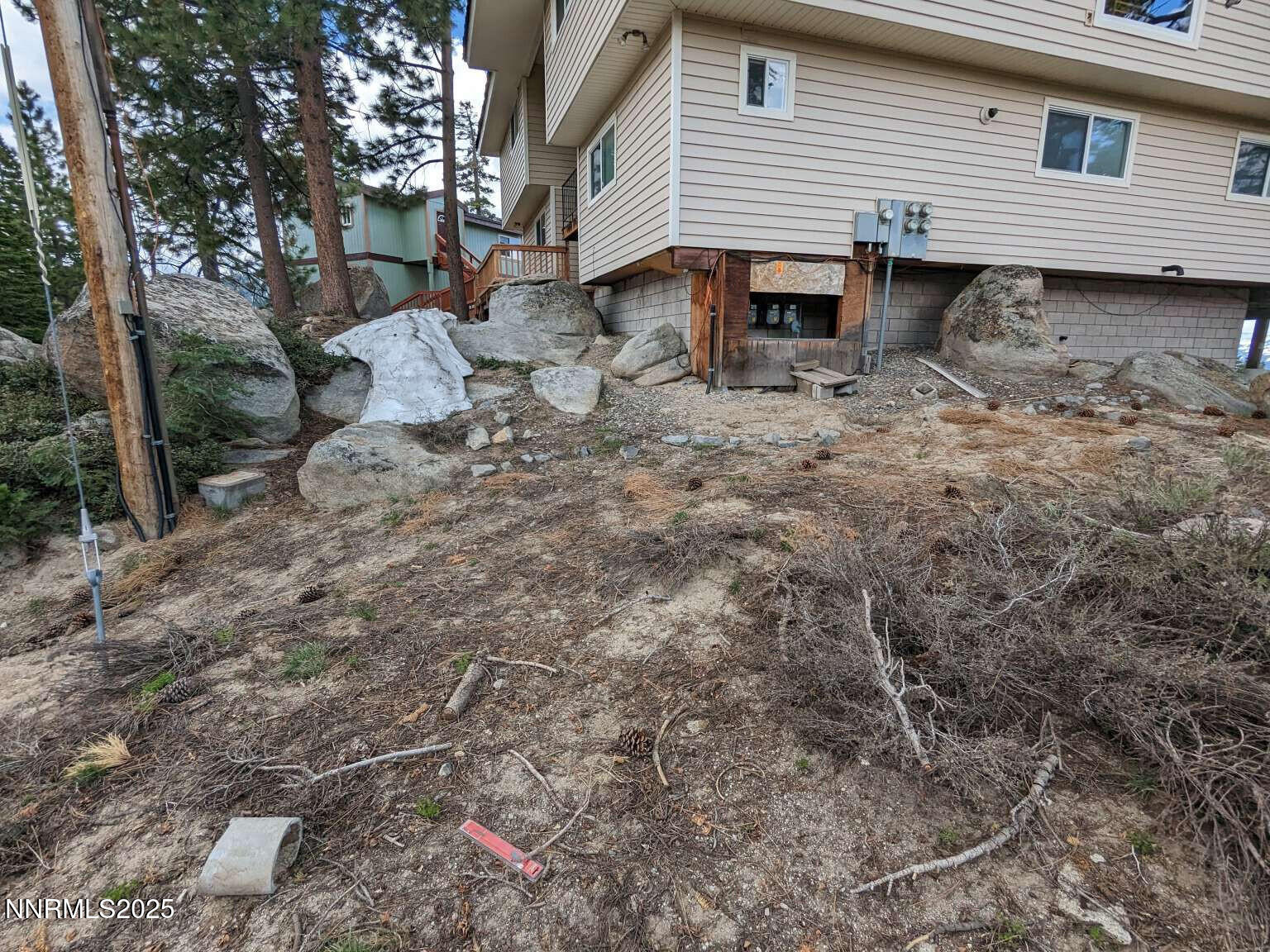 716 Tina Court Stateline, NV 89449 - Photo 8 of 10 a view of a house with a backyard