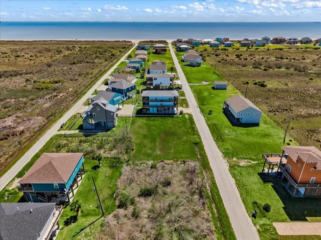 an aerial view of a house with a garden