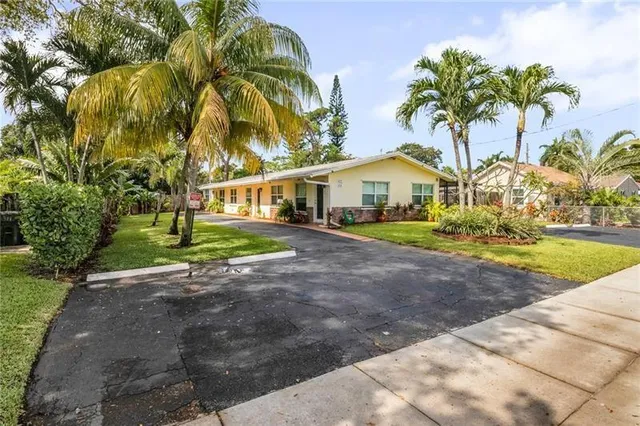 a view of outdoor space yard and front view of a house