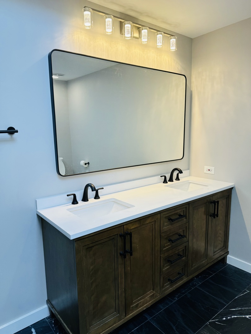 1398 East Gartner Road Naperville, IL 60540 - Photo 22 of 31 a bathroom with a double vanity sink and mirror