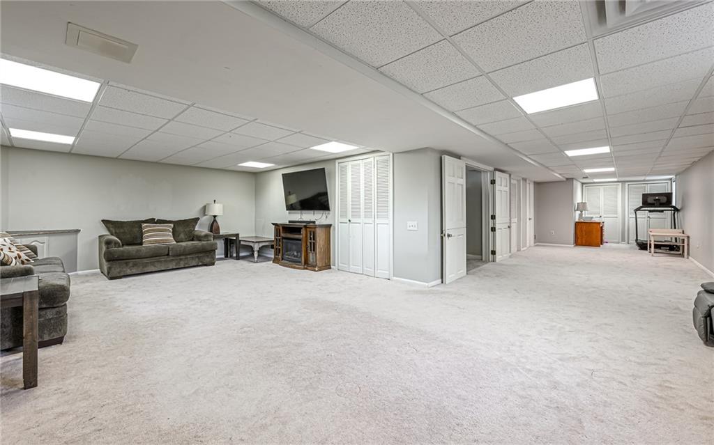 27 Kaufman Road Gibsonia, PA 15044 - Photo 31 of 41 The Game Room is MASSIVE with Double Dutch Doors into the room, a Full Bath and tons of storage