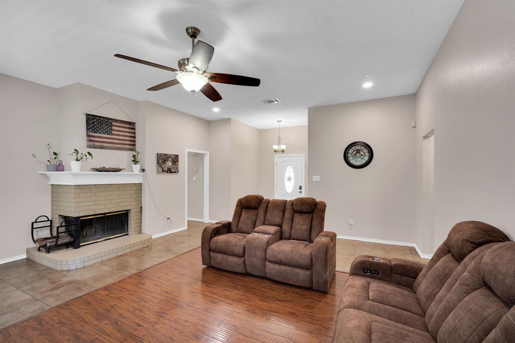 1001 Short Line Boulevard Midlothian, TX 76065 - Photo 2 of 26 Living area featuring wood-finish flooring, a neutral color palette, and recessed lighting