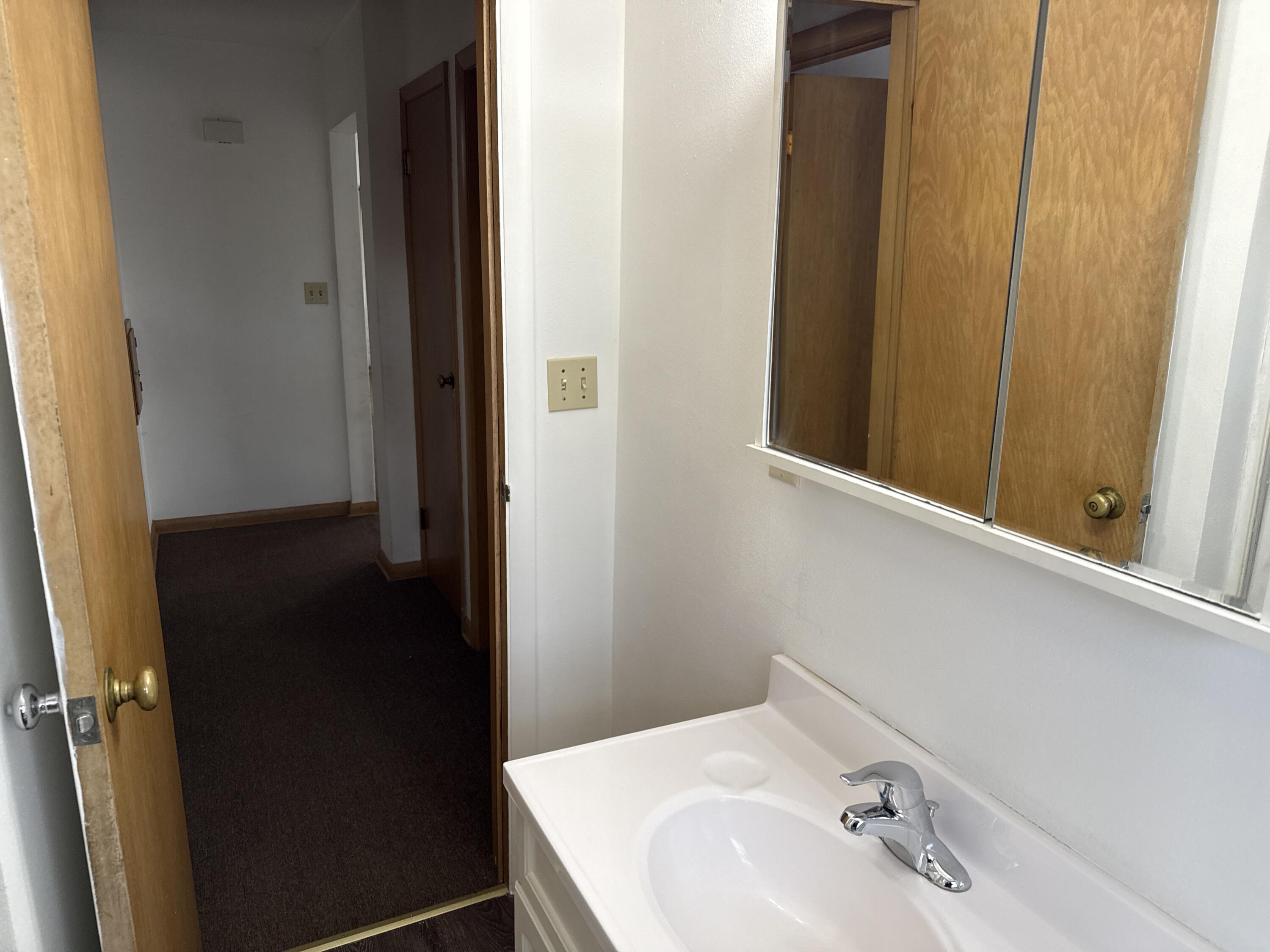 3819 68th Street Raymond, WI 53126 - Photo 62 of 63 68th Bathroom 2 w common area view