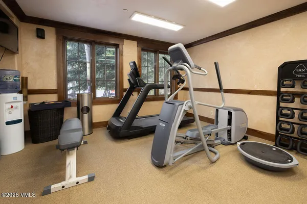 a view of a swimming pool with sitting area
