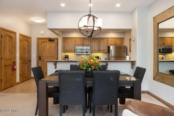 a view of a dining room with furniture