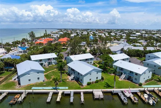 an aerial view of a house with a garden
