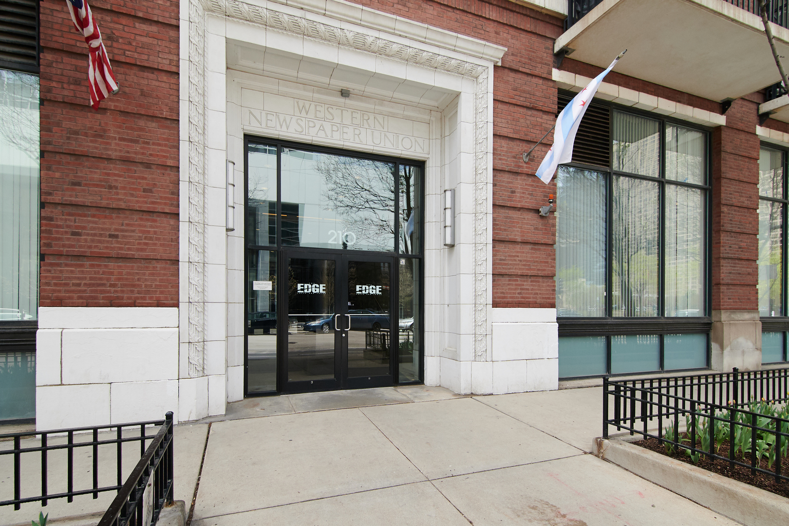210 South Desplaines Street, Unit 1003 Chicago, IL 60661 - Photo 2 of 27 a view of entrance with a house