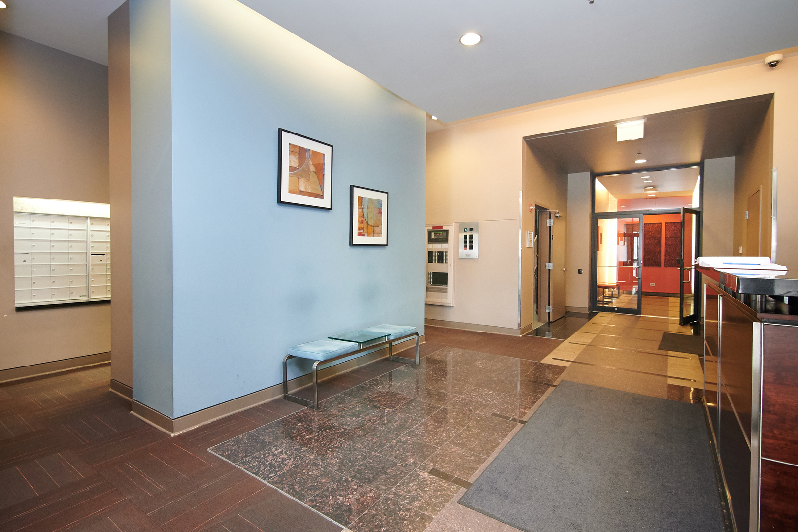 210 South Desplaines Street, Unit 1003 Chicago, IL 60661 - Photo 17 of 27 a view of livingroom with hardwood floor and a hallway