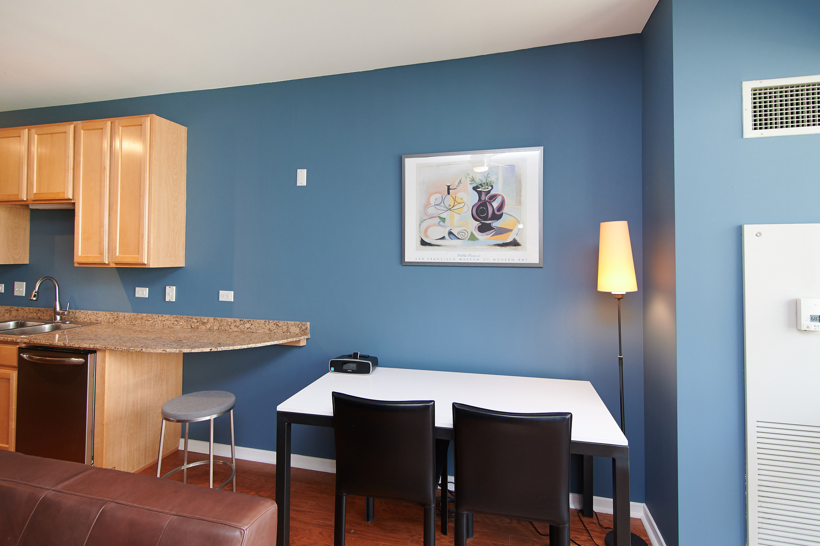 210 South Desplaines Street, Unit 1003 Chicago, IL 60661 - Photo 9 of 27 a view of a dining room with furniture and window