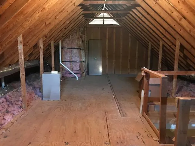 a view of an empty room with a garage