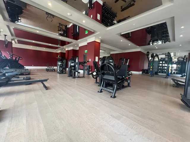 a view of a room with gym equipment