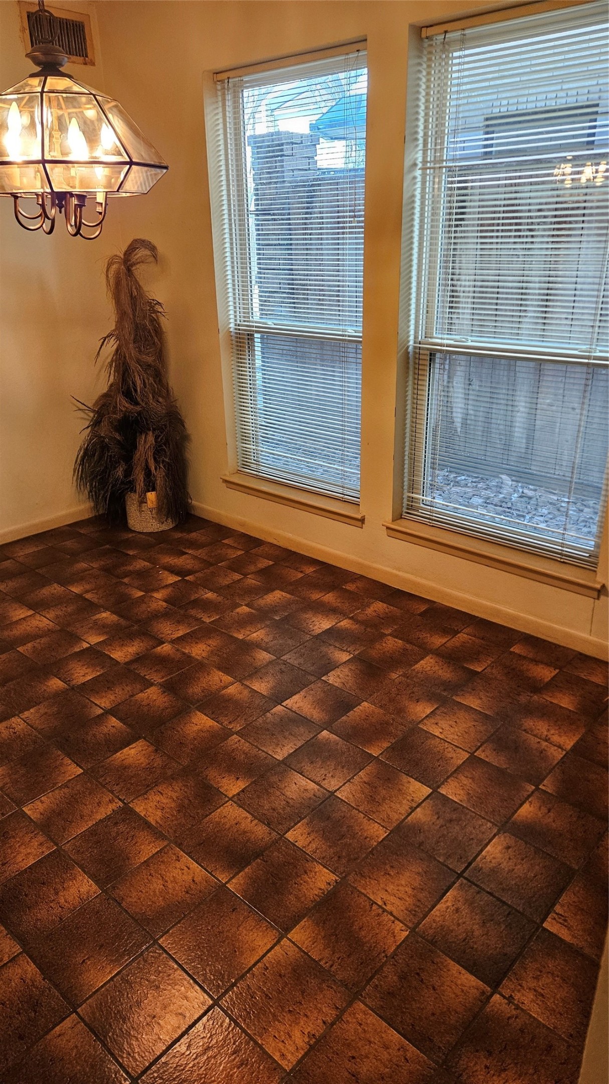 5607 Innsbruck Street Bellaire, TX 77401 - Photo 3 of 11 a view of a livingroom with a window and a chandelier