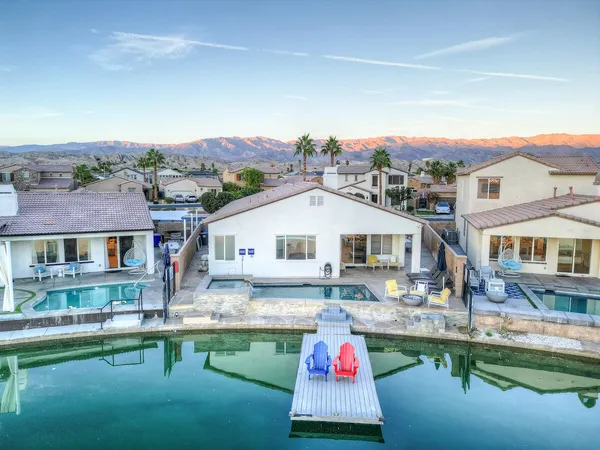 a house view with sitting space and garden view