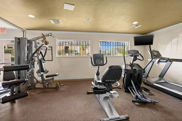 a view of a room with gym equipment