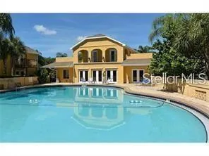 a view of a house with a swimming pool