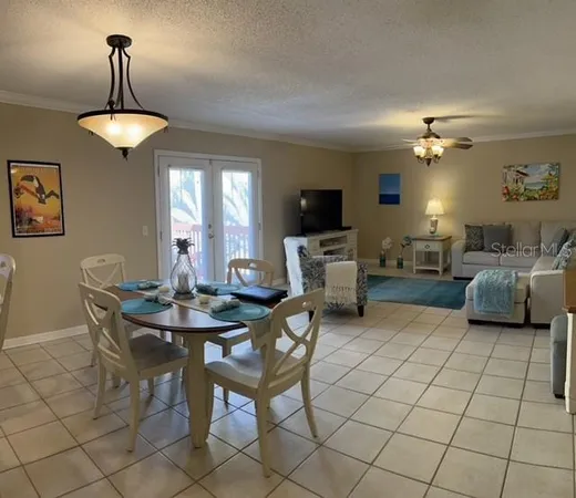 a view of a livingroom with furniture and chandelier