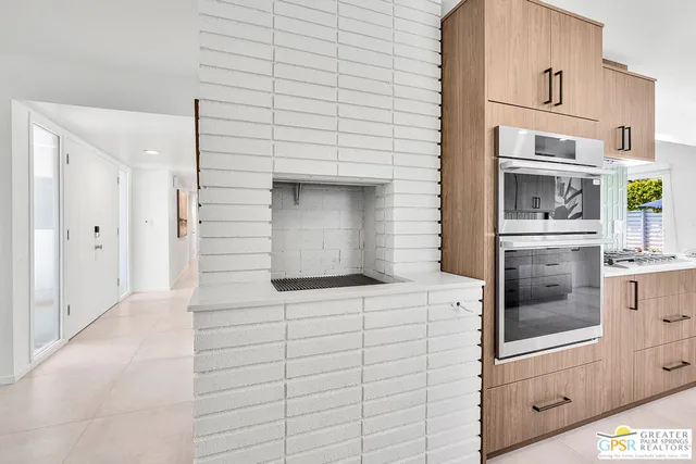a bathroom with a shower and a sink