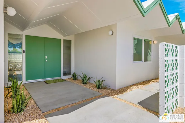 a front view of a house with a garage