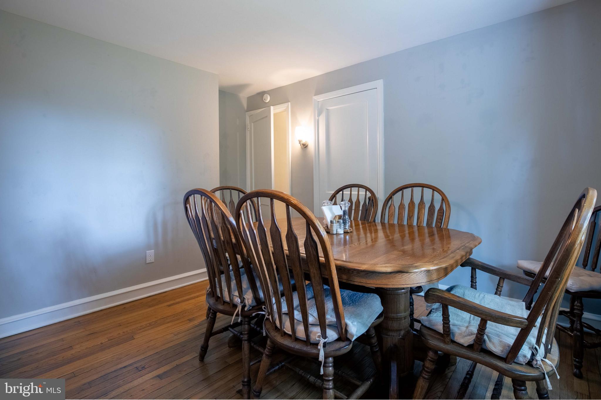1042 Thrush Lane Norristown, PA 19403 - Photo 13 of 30 a view of a dining room with furniture and wooden floor
